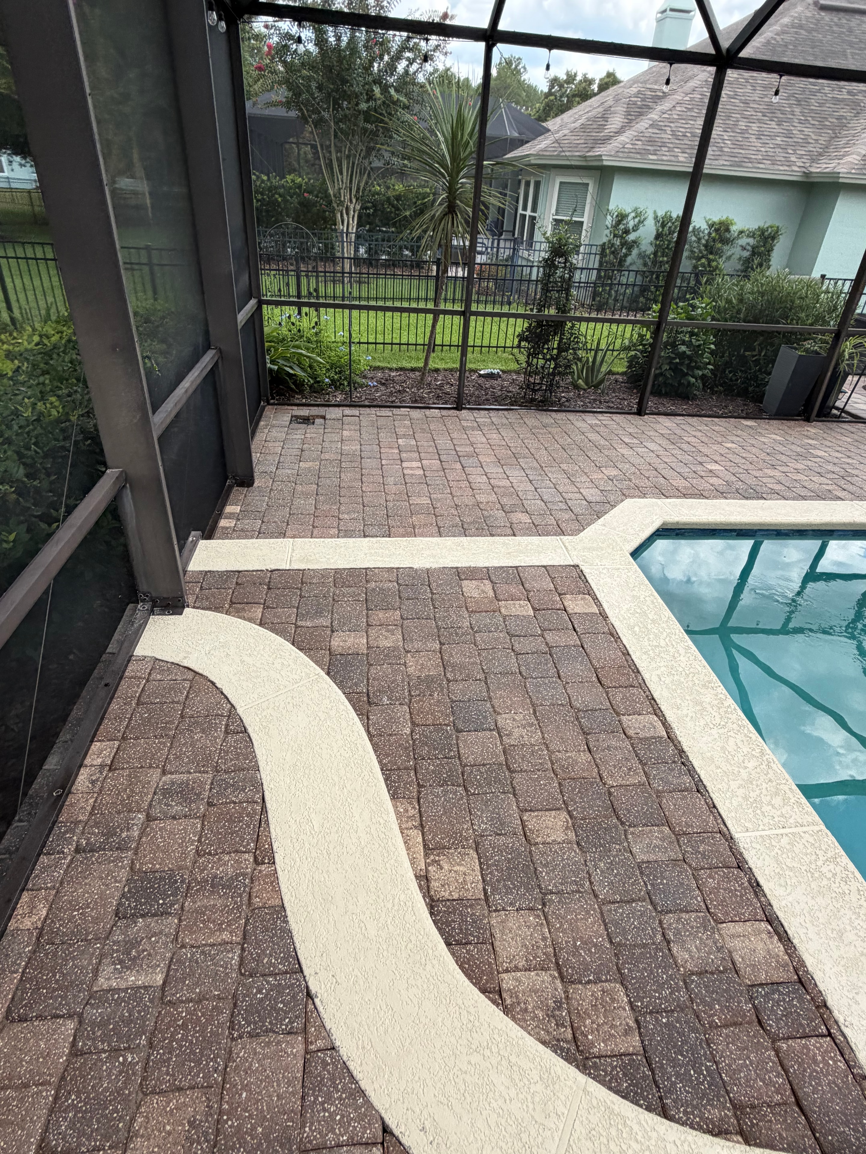 Pool deck pavers after professional cleaning and sealing — restored color and clean surface, Cimarrone, St. Johns, FL