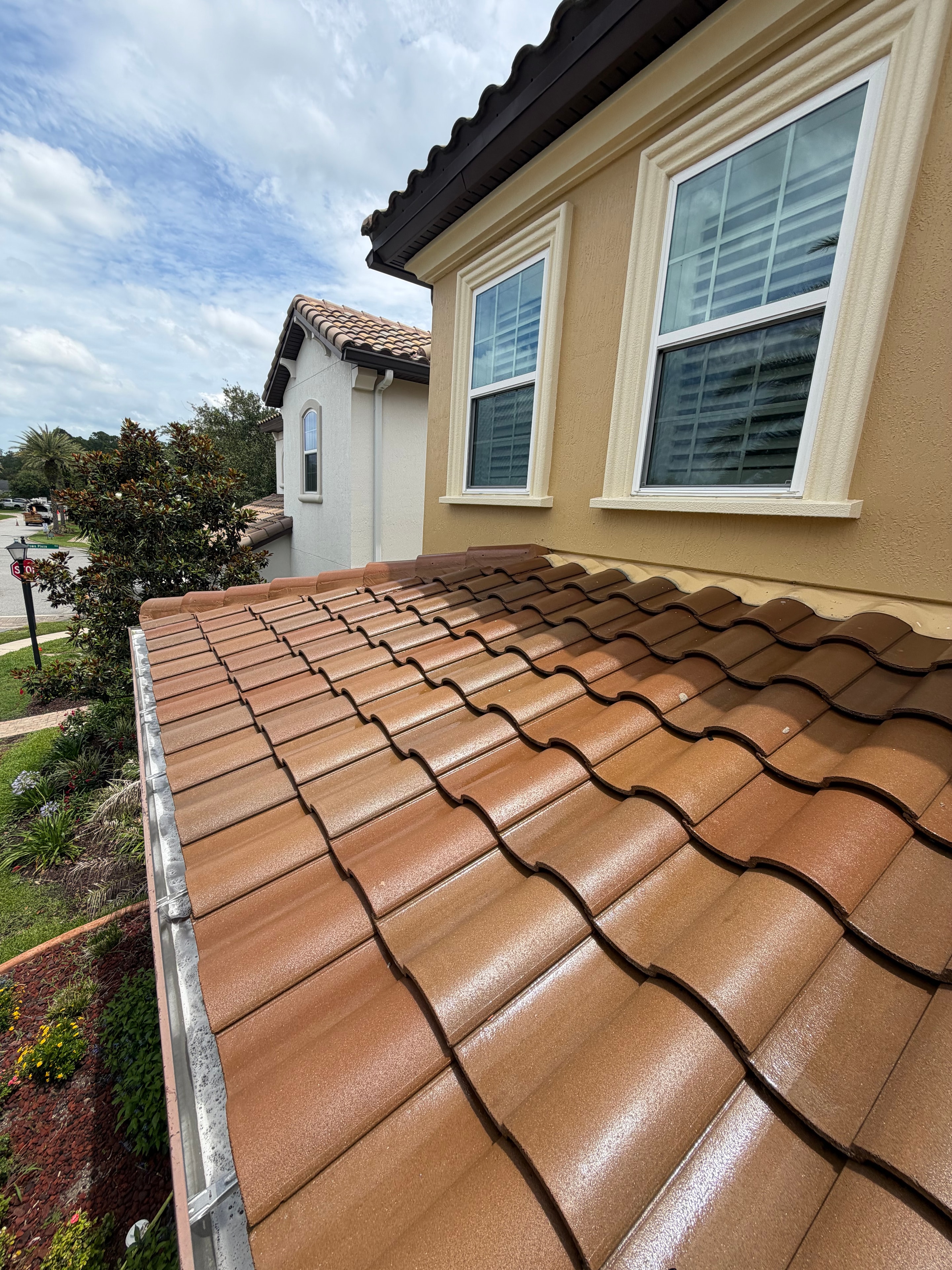 Clay tile roof after professional soft wash cleaning — restored terracotta color, Pablo Creek Reserve, Jacksonville, FL